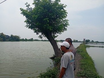 Dukung Asta Cita Presiden, Polsek Duduksampeyan Monitoring Tambak Ikan untuk Perkuat Swasembada Pangan Nasional